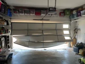 el paso garage door repair 1 - damage viewed from the inside