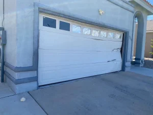 el paso garage door repair 2 - dent on the panels viewed from outside