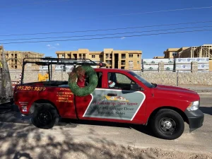 el paso garage door repair truck - with logo and details printed on it