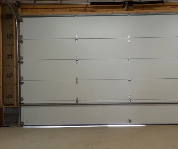 how to seal garage door gaps