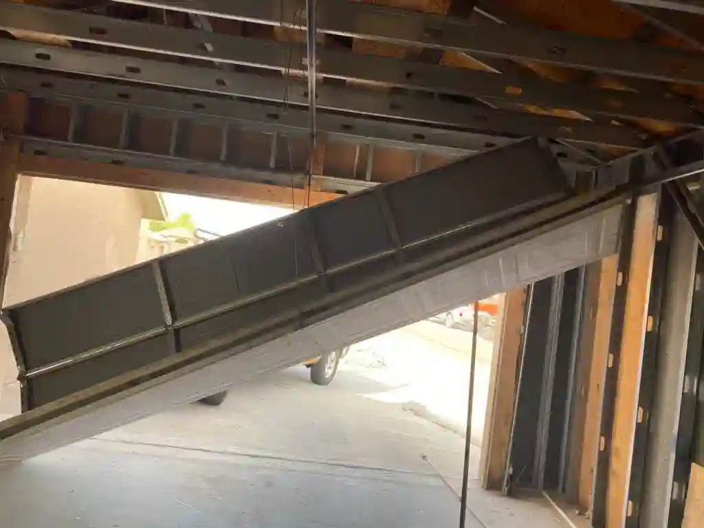 how to repair a garage door off track