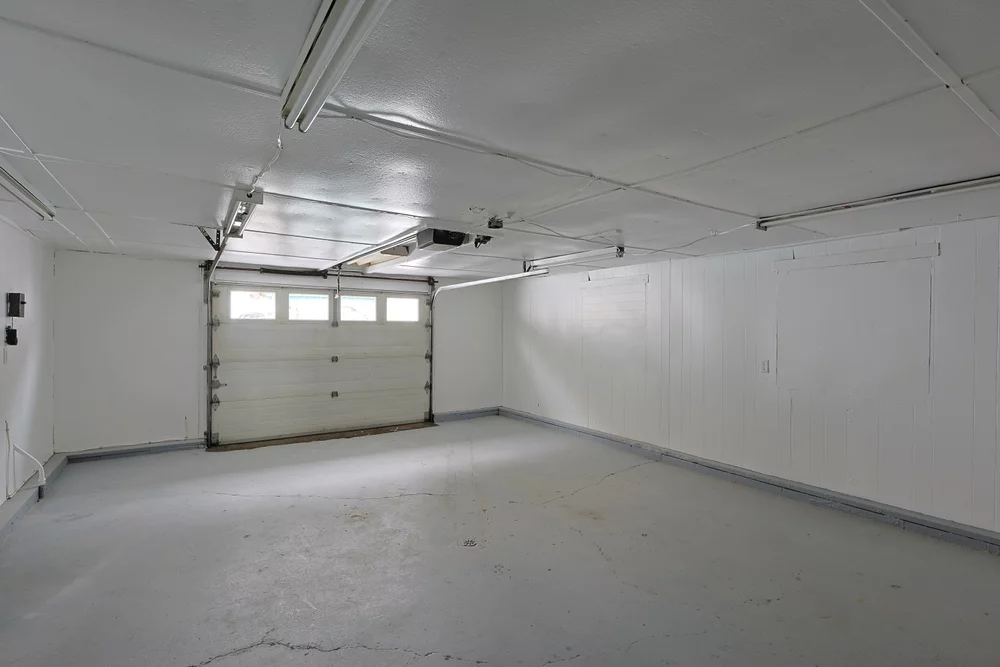 A view of a closed garage door from the inside.